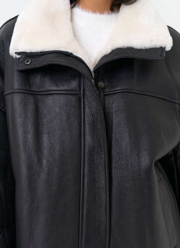 Женская натуральная дубленка черного цвета